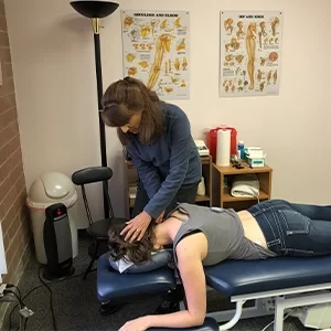 Chiropractor Lake Villa IL Pamela Norley Adjusting Patient